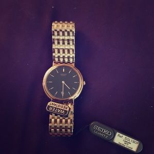 Seiko Quartz Gold Watch With Black Dial
